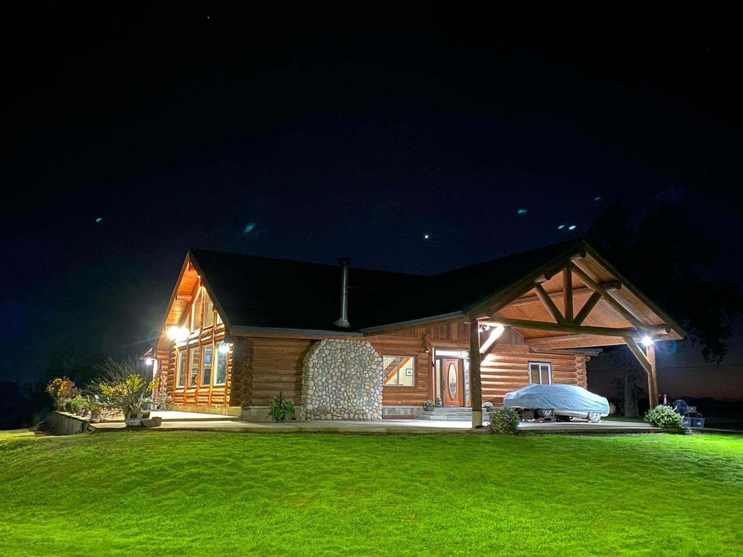 29266 Dry Creek Road Galt, CA 95632 - Photo 3 of 44 a front view of a house with a yard