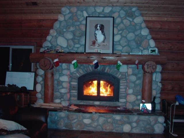 29266 Dry Creek Road Galt, CA 95632 - Photo 8 of 44 closeup of a fireplace with wooden floor