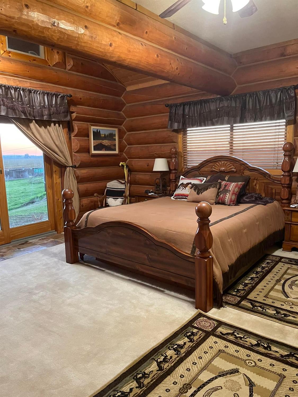 29266 Dry Creek Road Galt, CA 95632 - Photo 9 of 44 a bedroom with bed or wooden floor