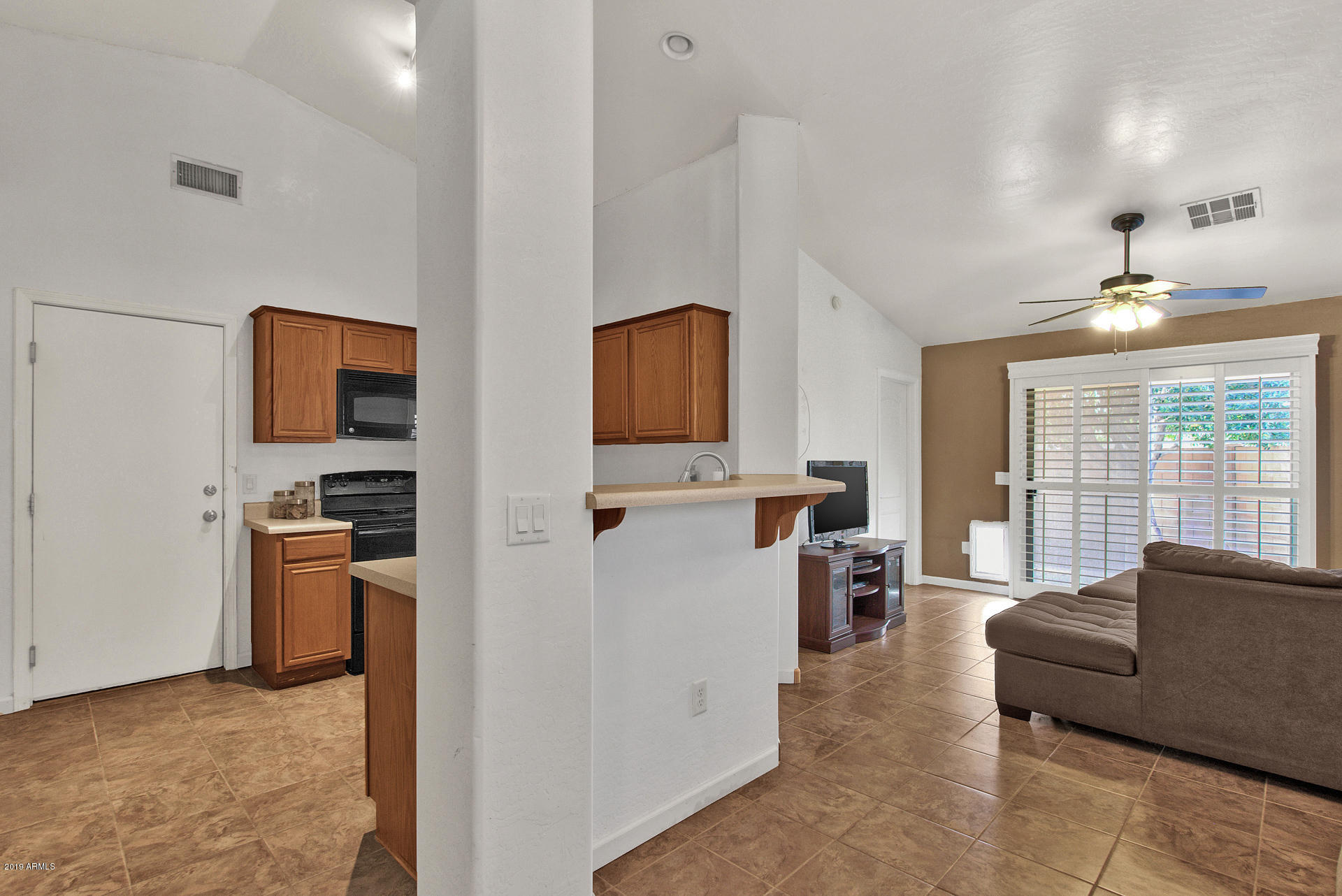 1260 South Lindsay Road, Unit 9 Mesa, AZ 85204 - Photo 9 of 24 Kitchen Opens into Great Room