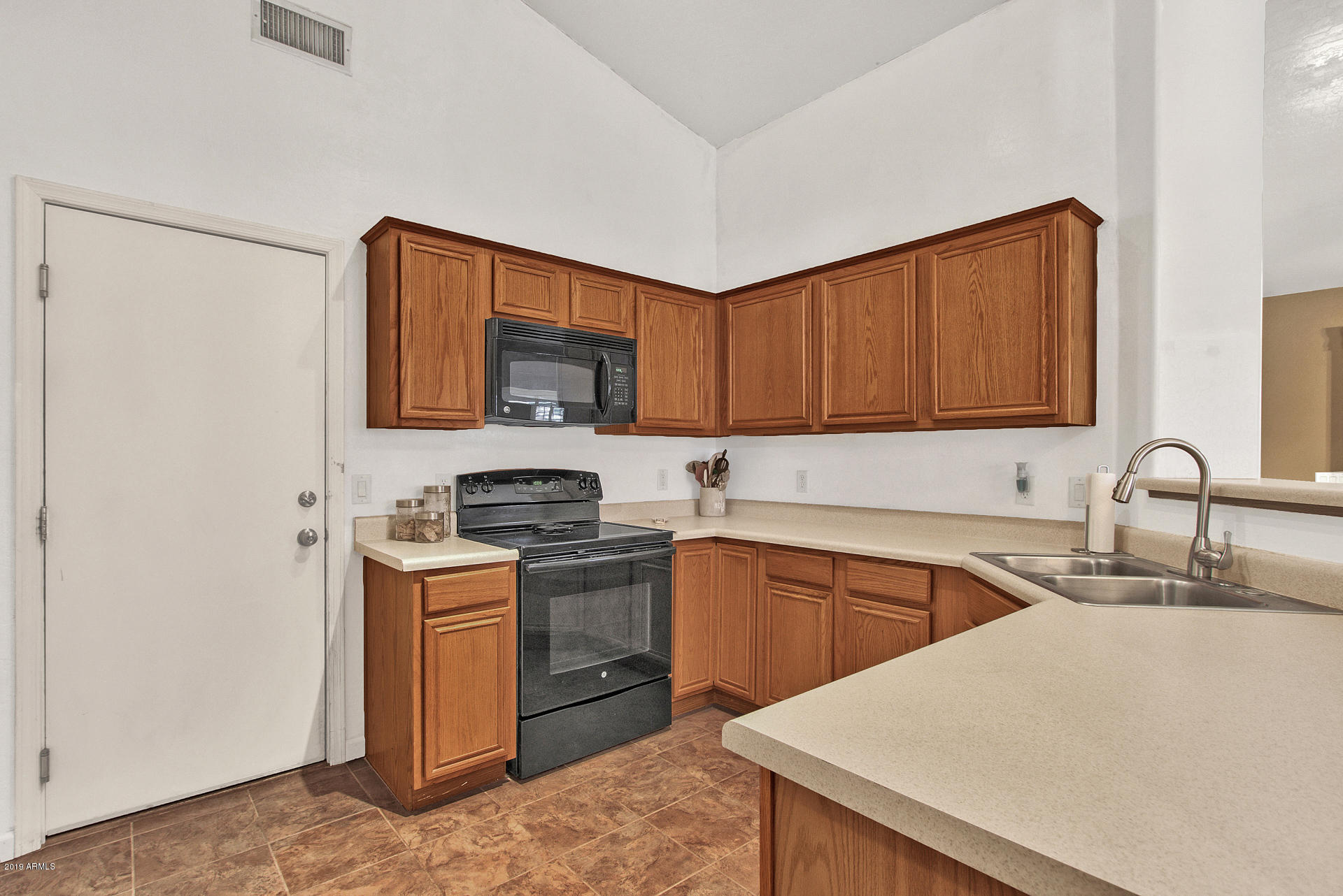 1260 South Lindsay Road, Unit 9 Mesa, AZ 85204 - Photo 10 of 24 Garage Access off Kitchen