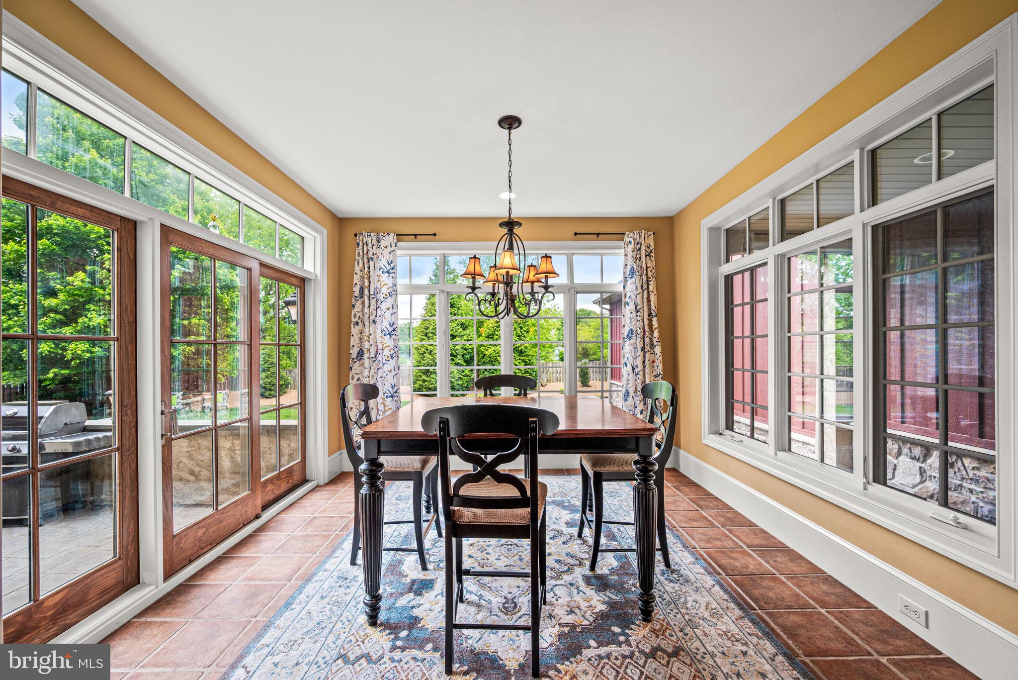 1548 Morstein Road Malvern, PA 19355 - Photo 23 of 80 a dining room with furniture window and wooden floor