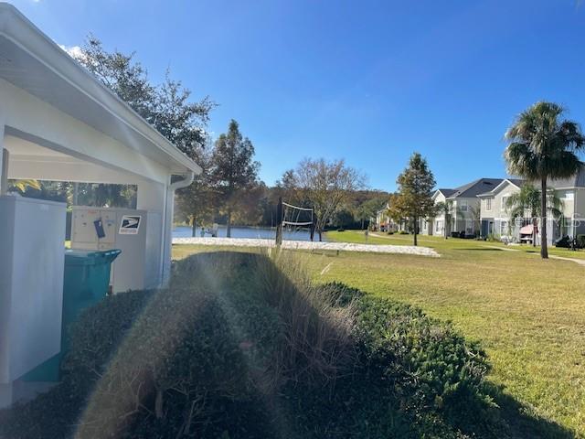 6536 South Goldenrod Road, Unit 67A Orlando, FL 32822 - Photo 11 of 14 a view of outdoor space with garden and trees