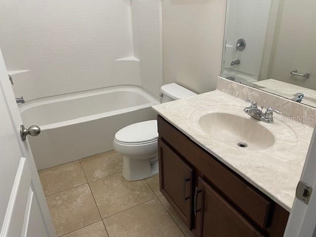 6536 South Goldenrod Road, Unit 67A Orlando, FL 32822 - Photo 7 of 14 a bathroom with a sink toilet and shower