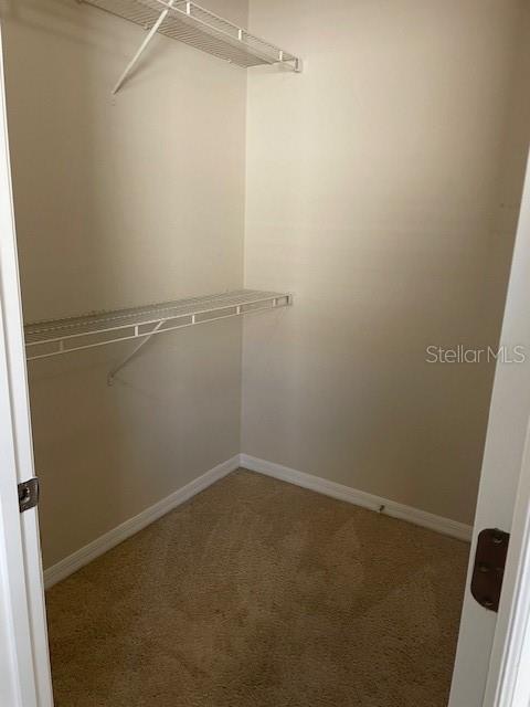 6536 South Goldenrod Road, Unit 67A Orlando, FL 32822 - Photo 8 of 14 a view of a room with racks on the wall