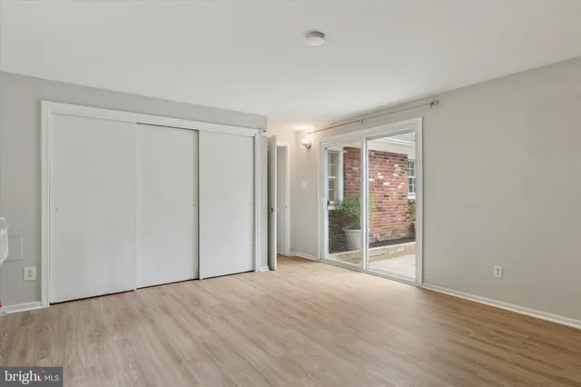 a view of entryway with wooden floor