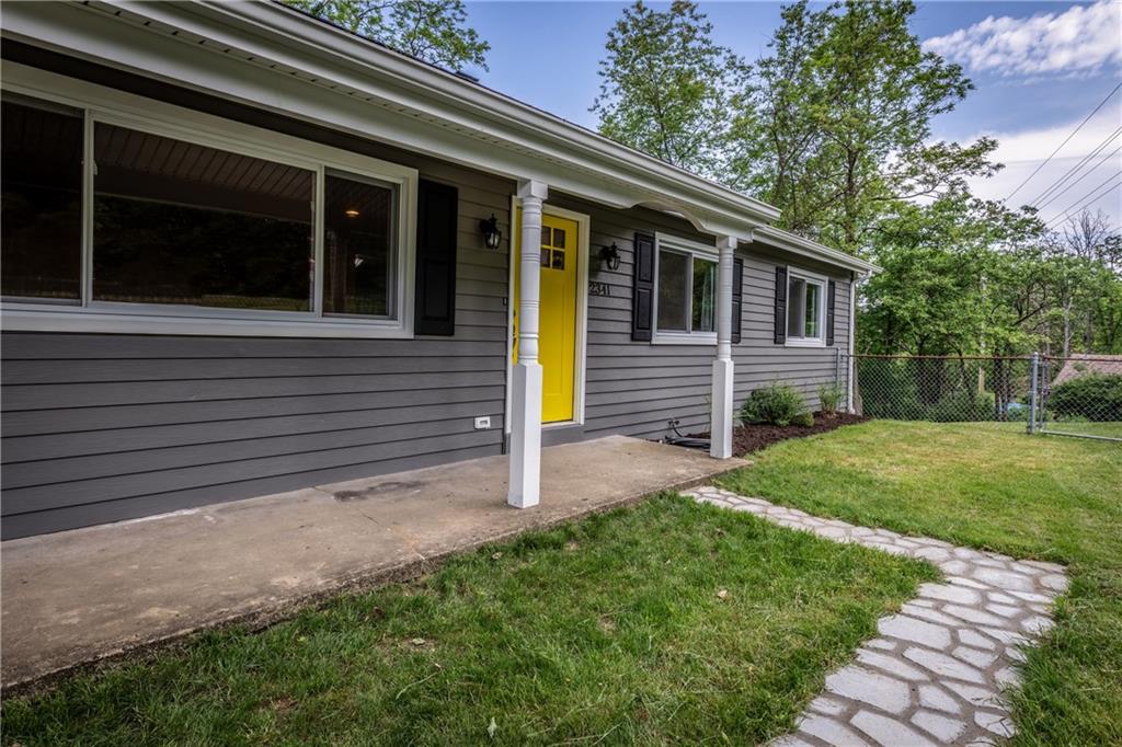 Front Porch with Fenced in Yard