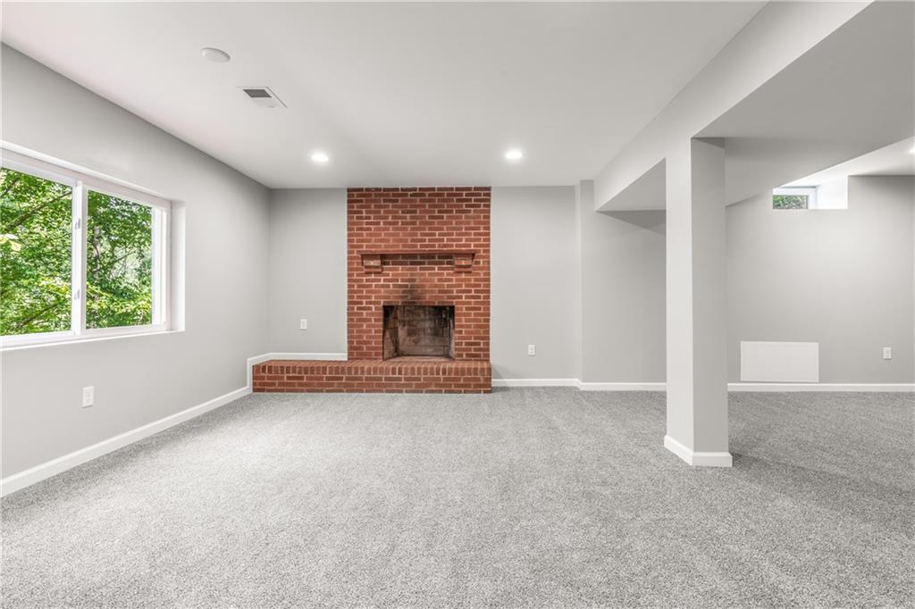 2341 West Hardies Road Gibsonia, PA 15044 - Photo 18 of 22 Game Room with Fireplace and Picture Window.