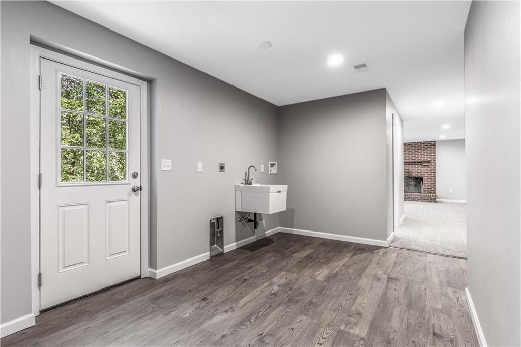 2341 West Hardies Road Gibsonia, PA 15044 - Photo 20 of 22 Laundry Room w/ walkout to backyard.