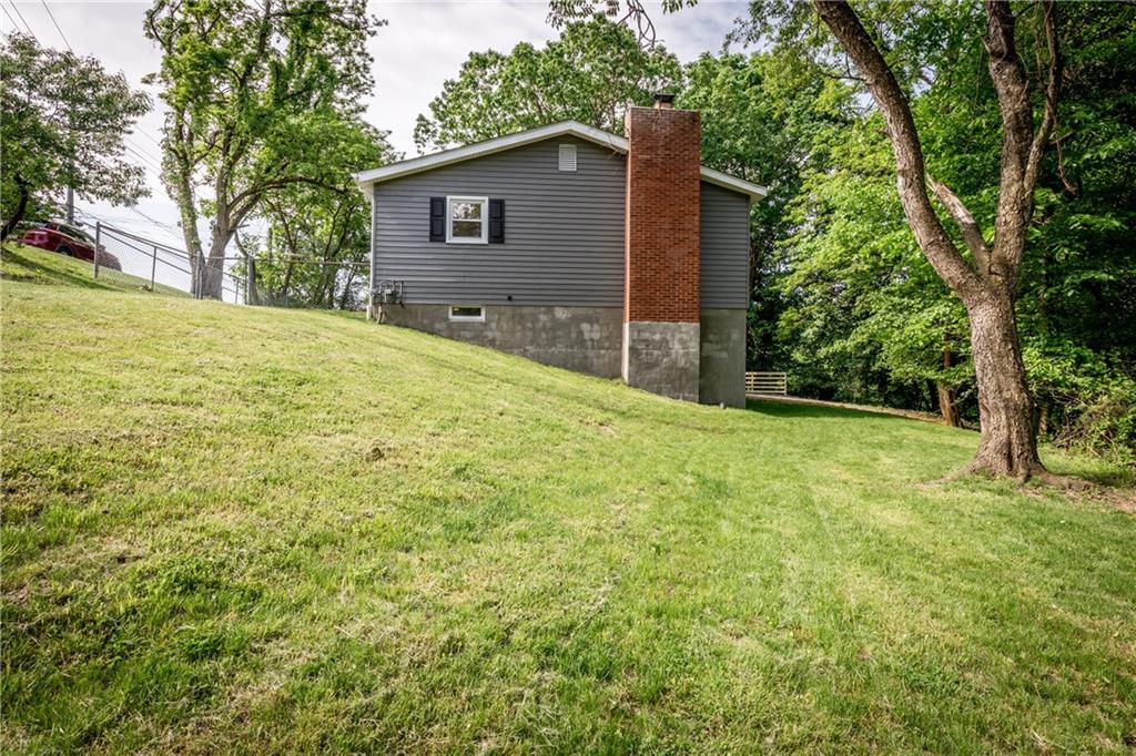 Large Side Yard to Right of Home