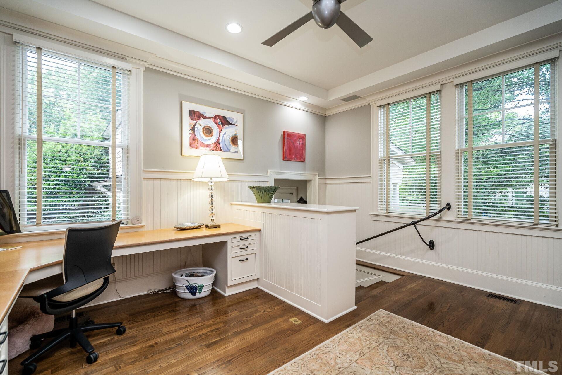 1027 Vance Street Raleigh, NC 27608 - Photo 13 of 42 a view of a workspace with furniture and a window
