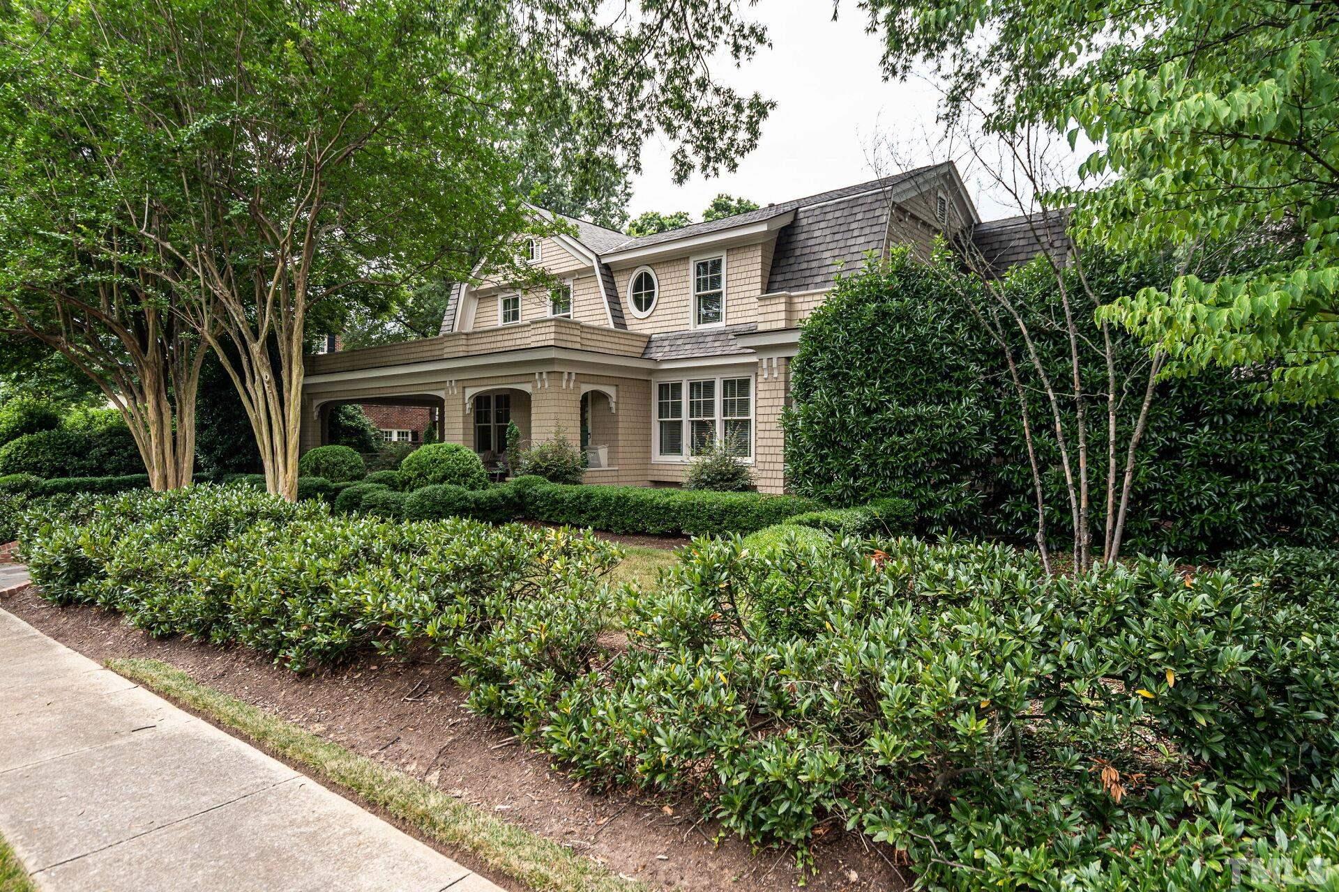 1027 Vance Street Raleigh, NC 27608 - Photo 2 of 42 front view of a house with a yard