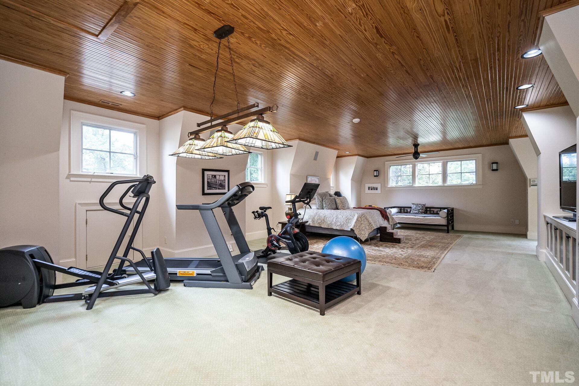1027 Vance Street Raleigh, NC 27608 - Photo 30 of 42 a view of a room with gym equipment