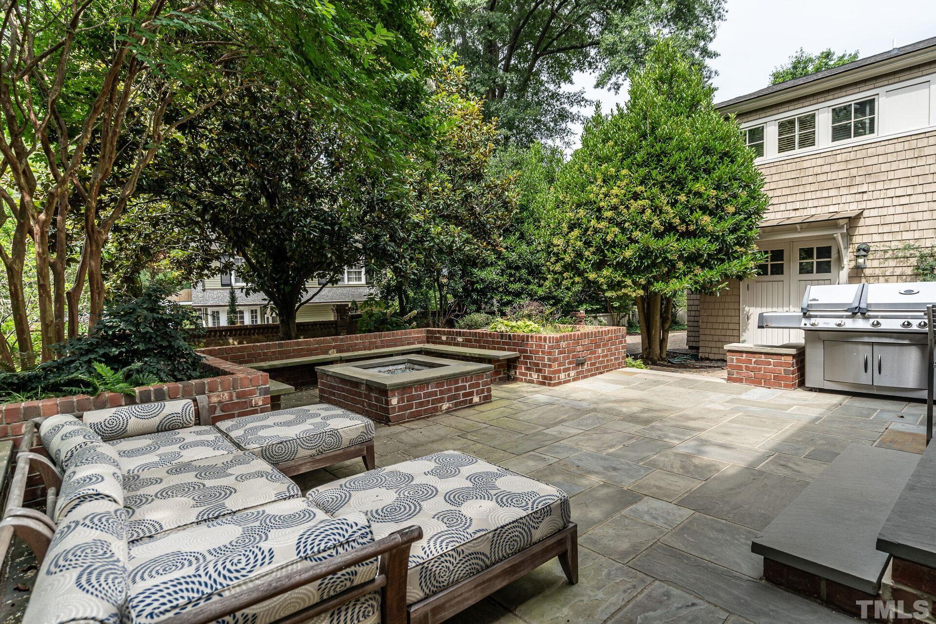 1027 Vance Street Raleigh, NC 27608 - Photo 34 of 42 a view of backyard with swimming pool and seating space