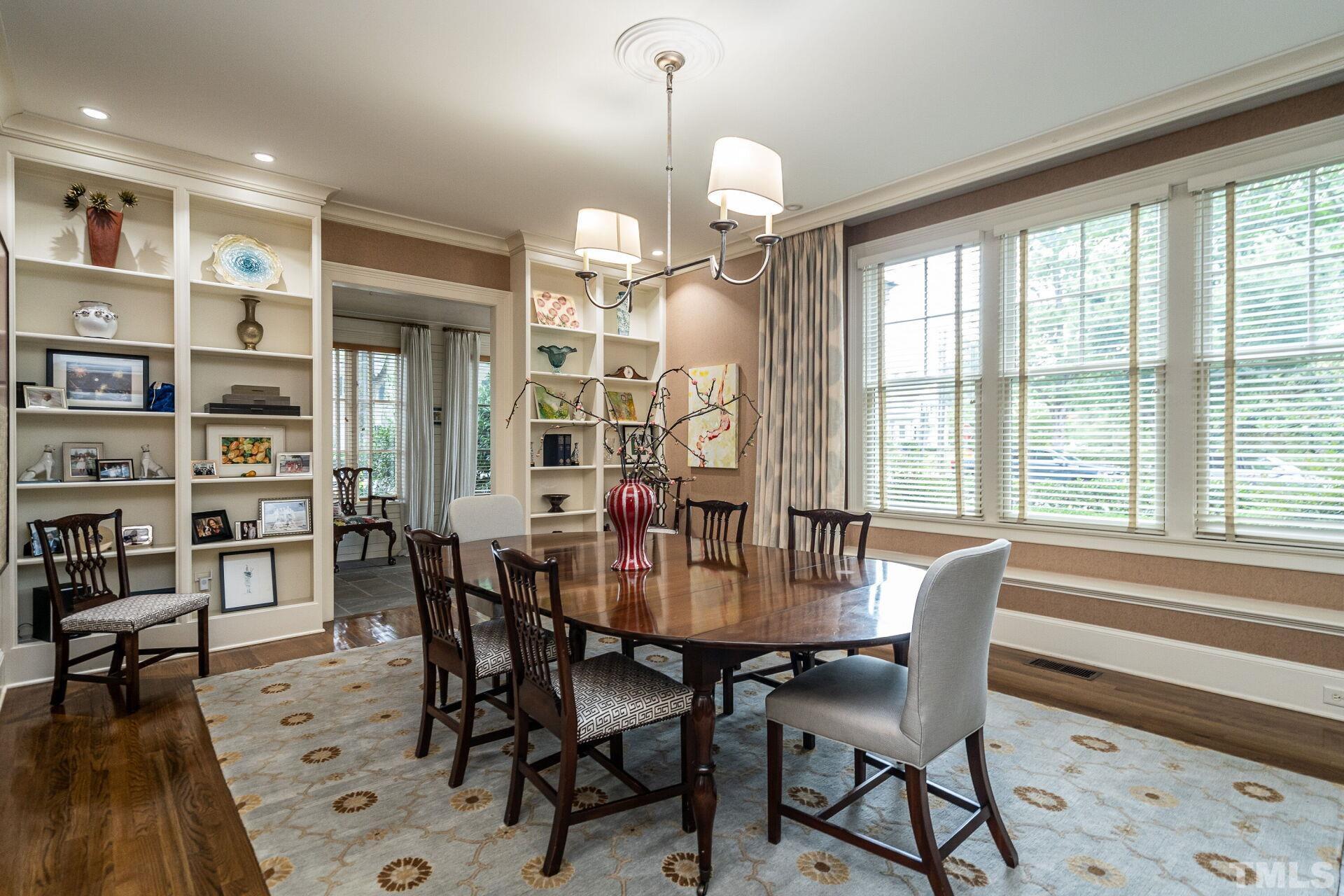 1027 Vance Street Raleigh, NC 27608 - Photo 9 of 42 a view of a dining room with furniture and window