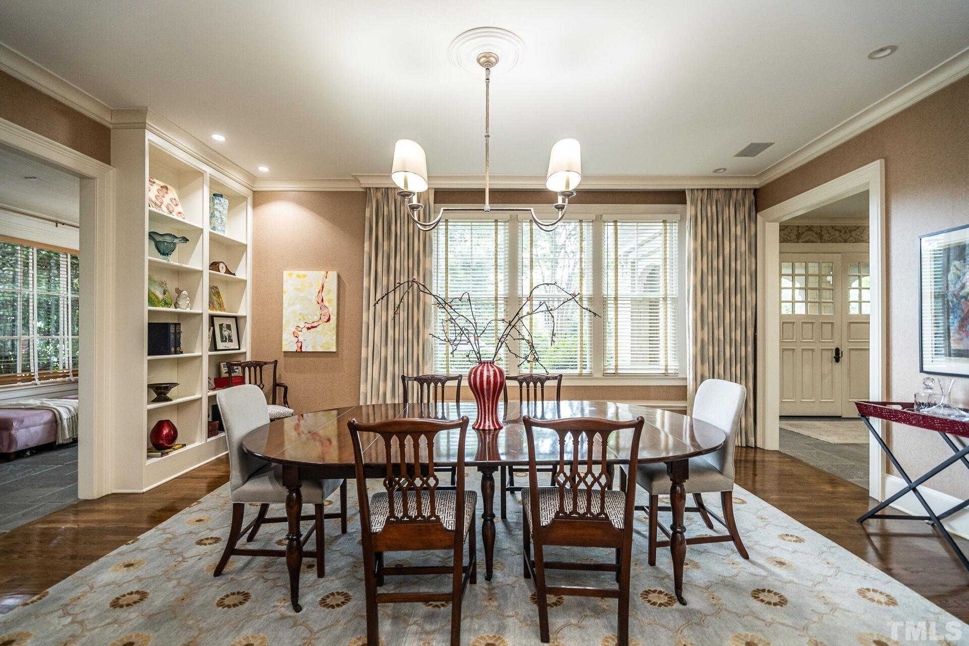 1027 Vance Street Raleigh, NC 27608 - Photo 10 of 42 a view of a dining room with furniture window and outside view