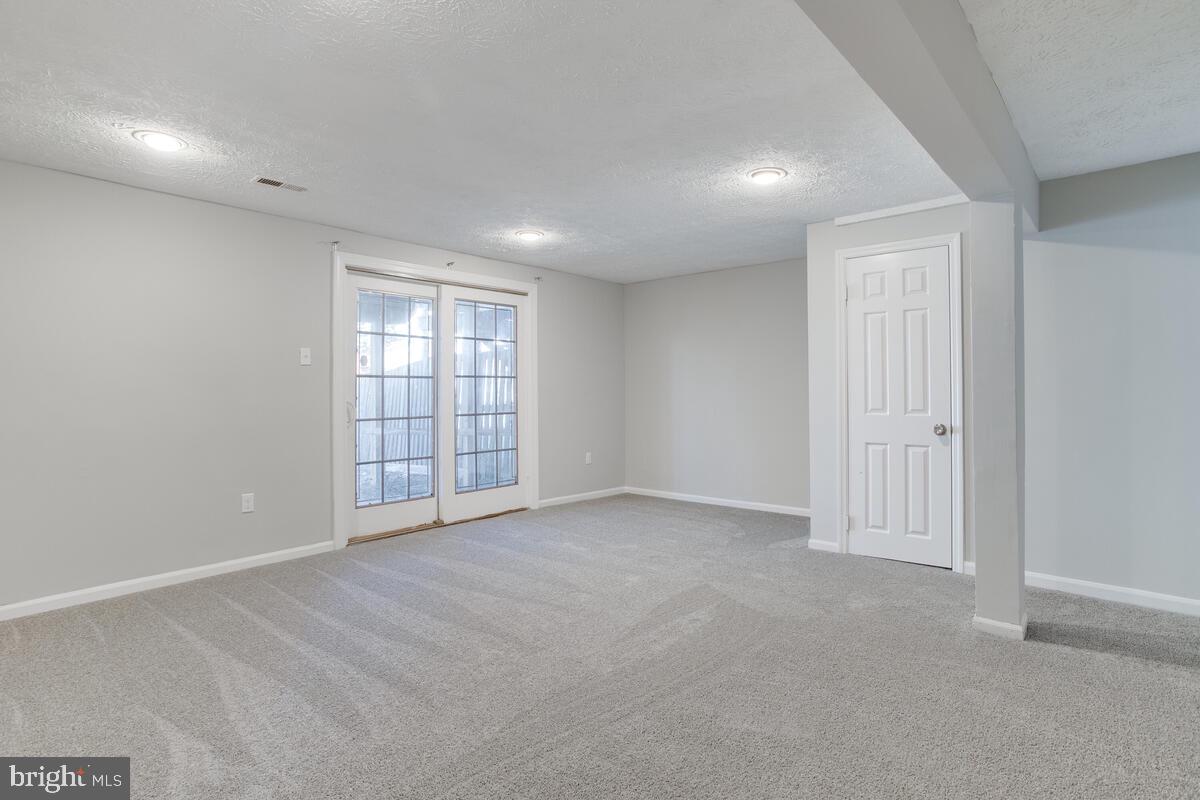 1308 Apple Ridge Court Edgewood, MD 21040 - Photo 26 of 38 an empty room with windows