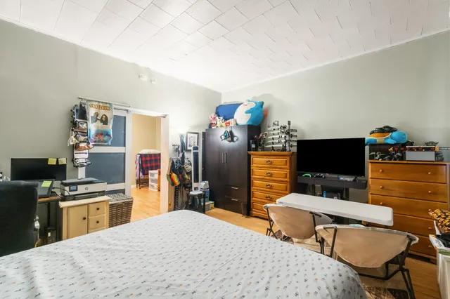 a bedroom with a bed and furniture