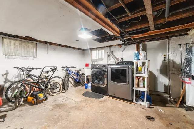 a view of a bike storage and utility room