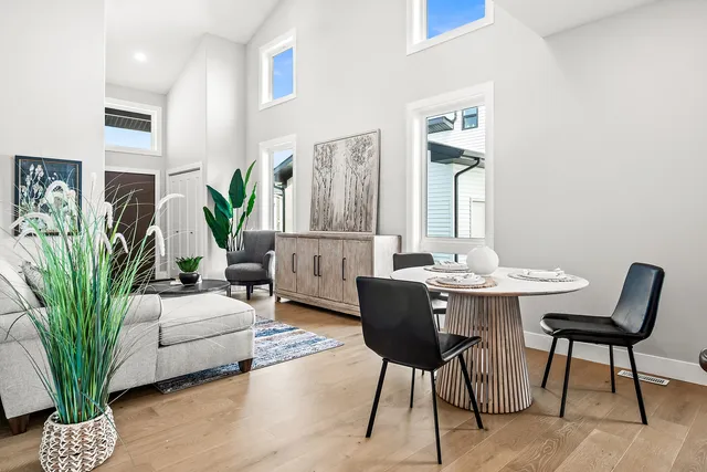 a view of a livingroom with furniture and a potted plant