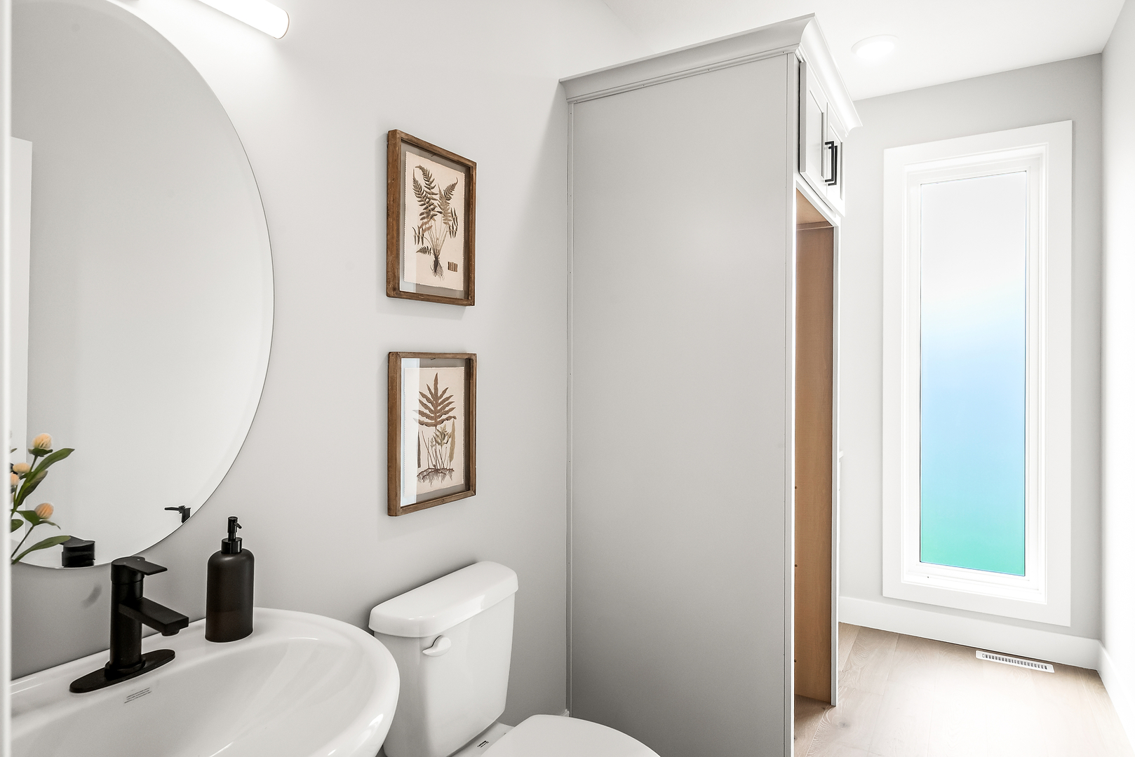 3613 Cabernet Court Normal, IL 61761 - Photo 15 of 41 a white toilet sitting next to a bathroom sink