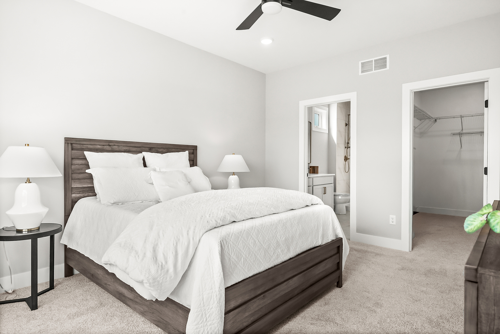 3613 Cabernet Court Normal, IL 61761 - Photo 19 of 41 a bedroom with bed and a chandelier