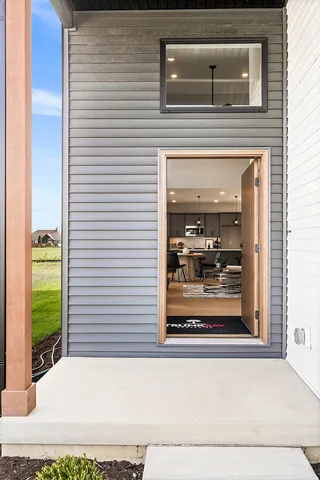 a view of a door and a window