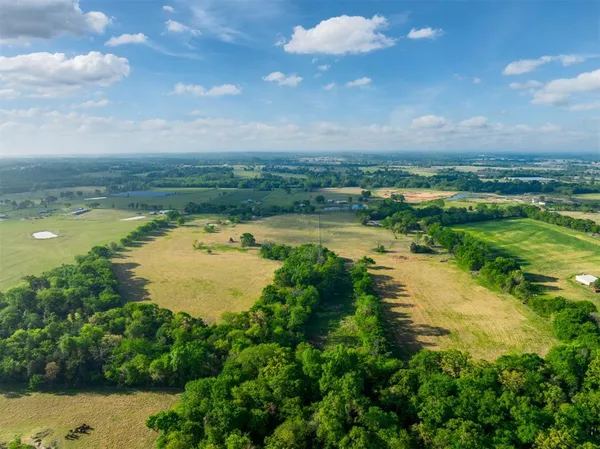 a view of a lake with a city
