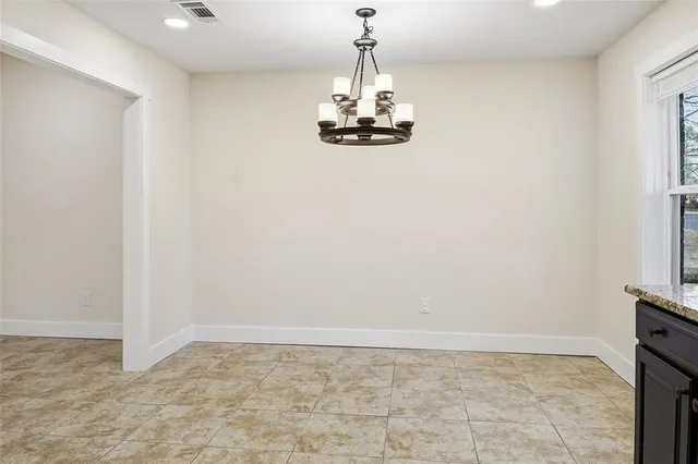 a view of a refrigerator in a room
