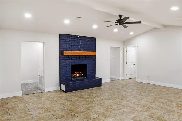 a living room with a fireplace