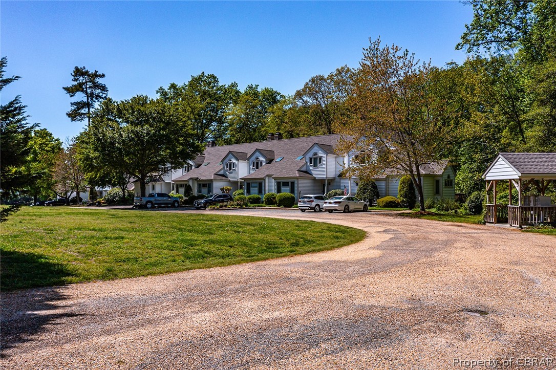 5818 Rivers Landing Terrace, Unit 5818 White Stone, VA 22578 - Photo 43 of 50 Cape cod home featuring a front lawn