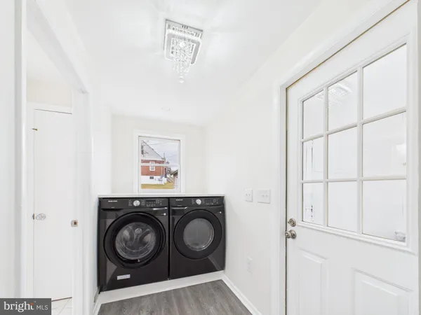 a view of washer and dryer in a utility room
