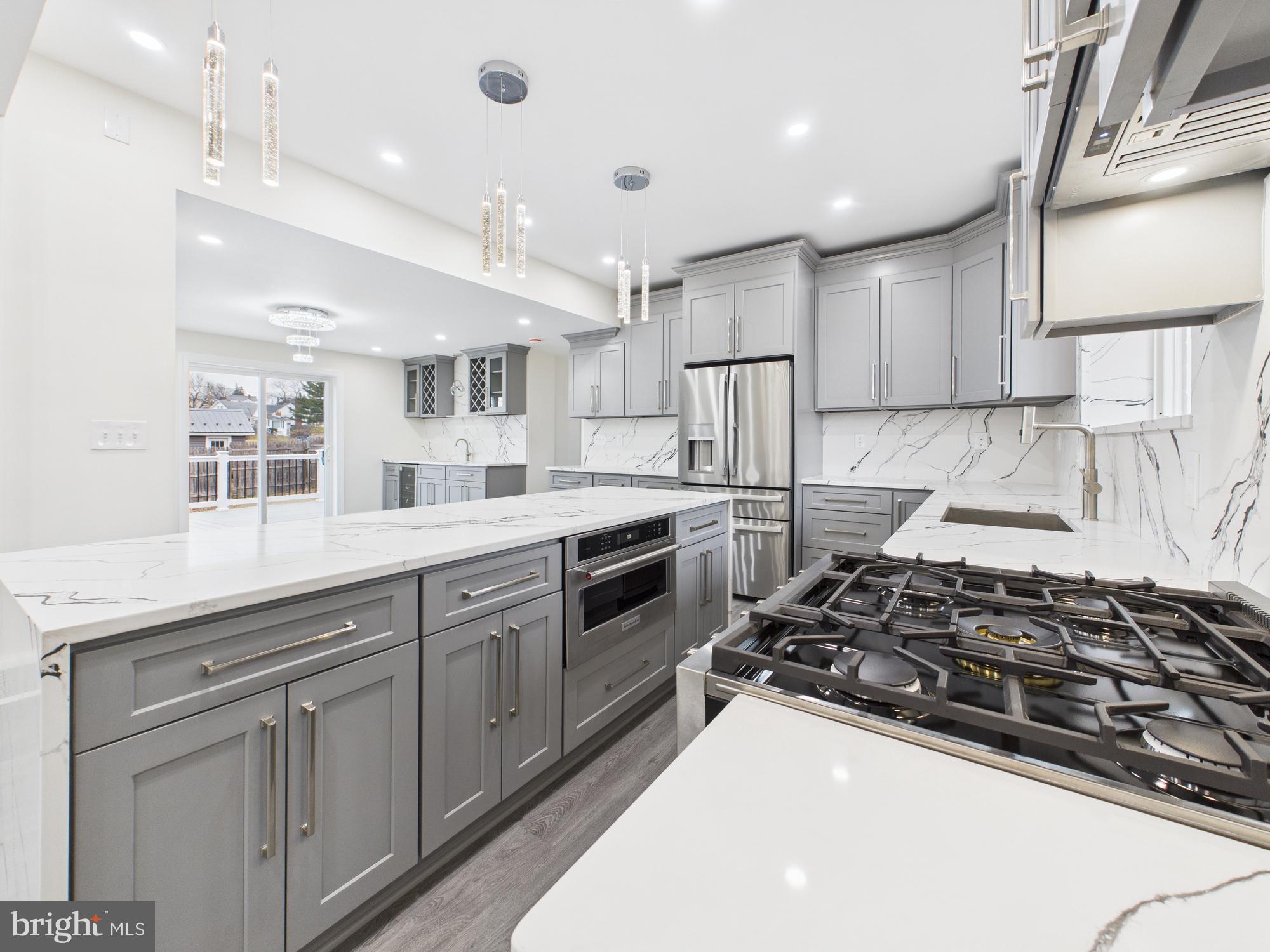 820 East Oldtown Road Cumberland, MD 21502 - Photo 7 of 40 a kitchen with stainless steel appliances a sink stove and cabinets
