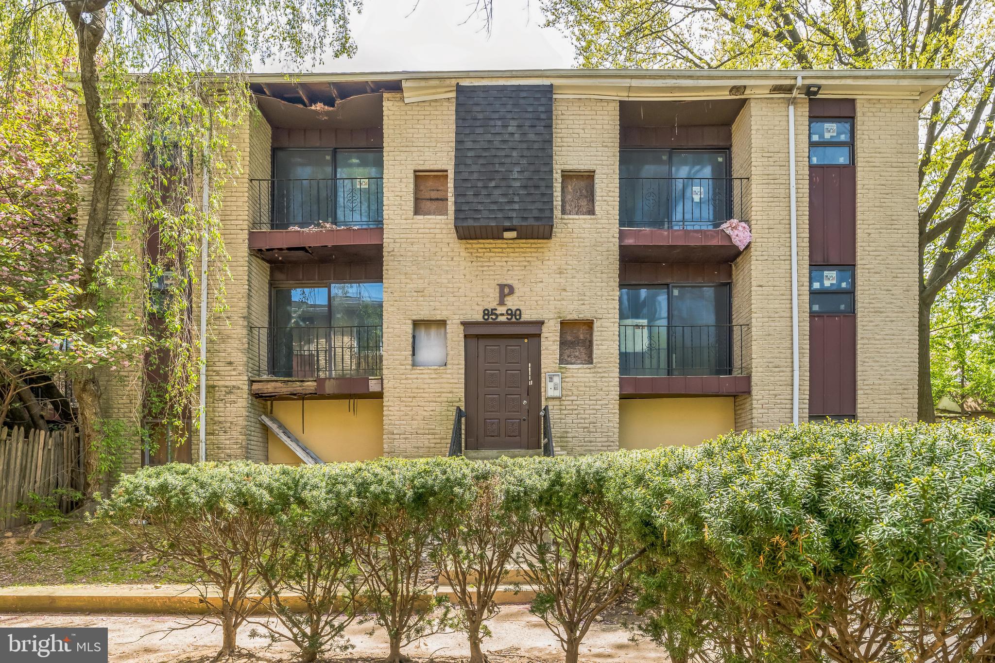 8030 Ditman Street, Unit 88P Philadelphia, PA 19136 - Photo 1 of 30 a front view of a house with garden