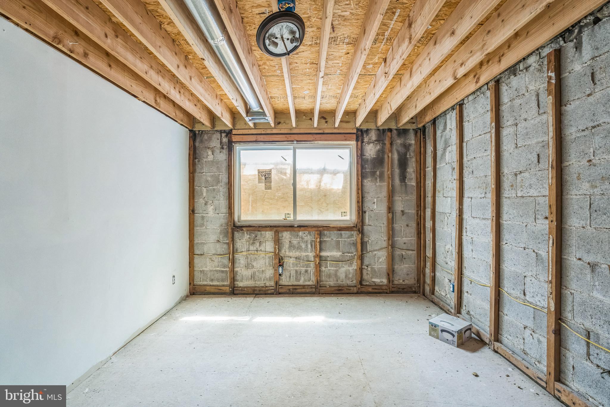 8030 Ditman Street, Unit 88P Philadelphia, PA 19136 - Photo 26 of 30 a view of an empty room with a window