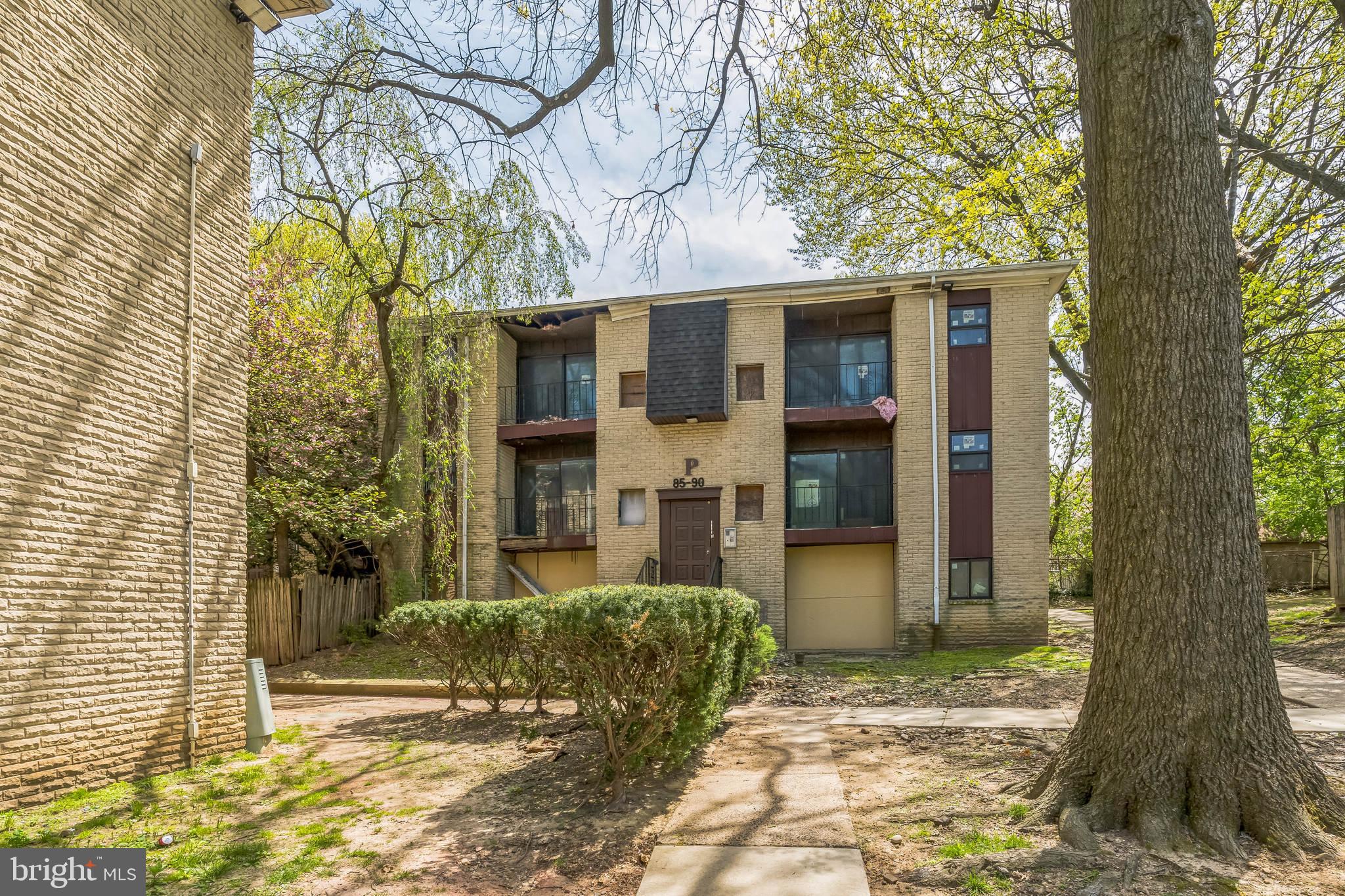 8030 Ditman Street, Unit 88P Philadelphia, PA 19136 - Photo 3 of 30 a view of a large trees in front of a house