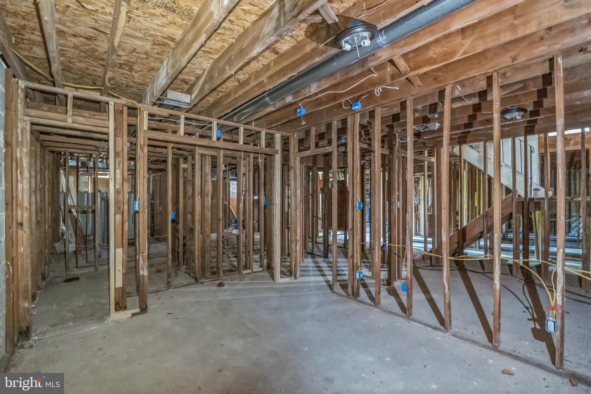 8030 Ditman Street, Unit 88P Philadelphia, PA 19136 - Photo 5 of 30 a view of an empty room with wooden walls