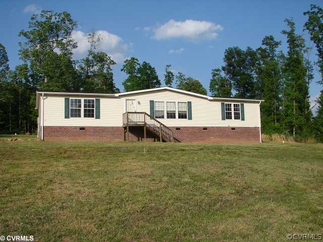2876 Modest Creek Road Victoria, VA 23974 - Photo 1 of 4 a house view with a garden space