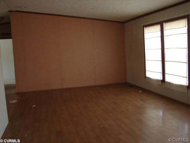 2876 Modest Creek Road Victoria, VA 23974 - Photo 3 of 4 an empty room with a window