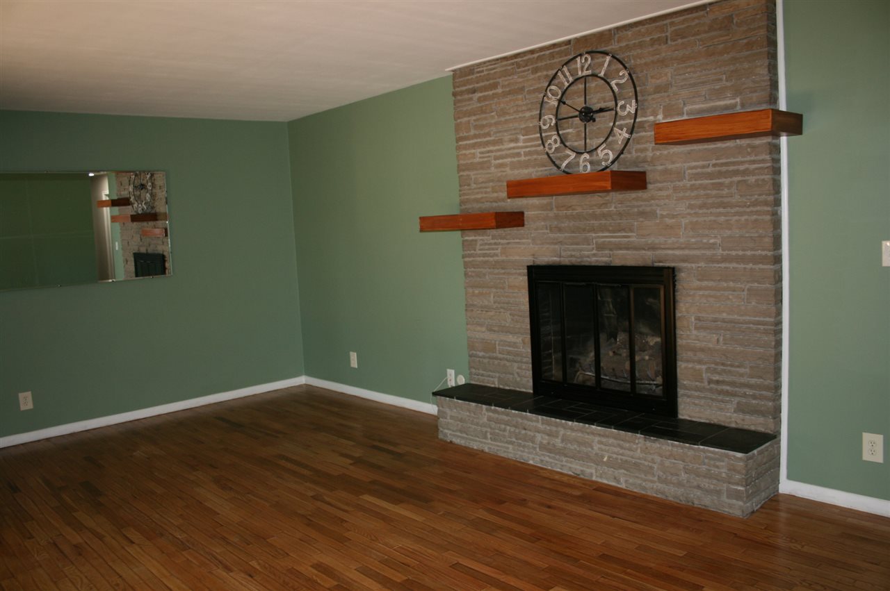 5466 Calkins Road Flint, MI 48532 - Photo 4 of 28 Living Room Fireplace