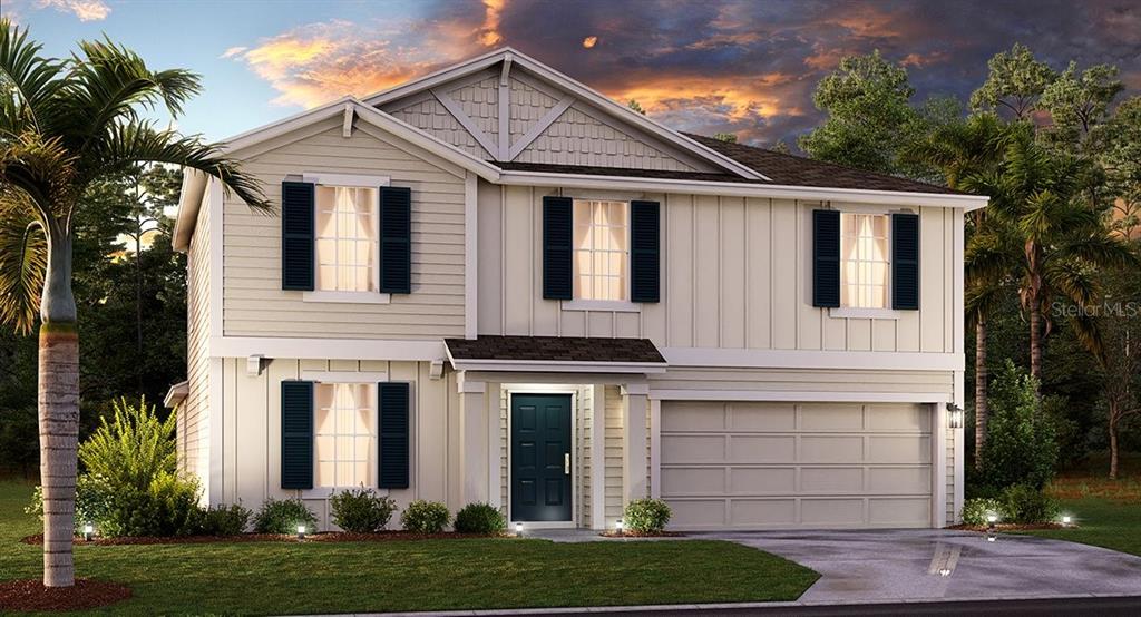 4476 Magnolia Ridge Court Kissimmee, FL 34746 - Photo 1 of 1 a front view of a house with a yard and garage