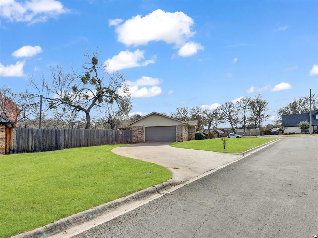 325 Huggins Drive Springtown, TX 76082 - Photo 24 of 28 a view of an house with pool and yard