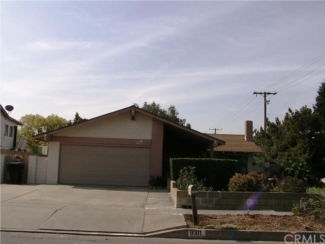 9311 Tryon Street Rancho Cucamonga, CA 91730 - Photo 1 of 1 sits South facing the beautiful mountains. Newer garage door with opener.