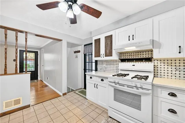 a utility room with washer and dryer