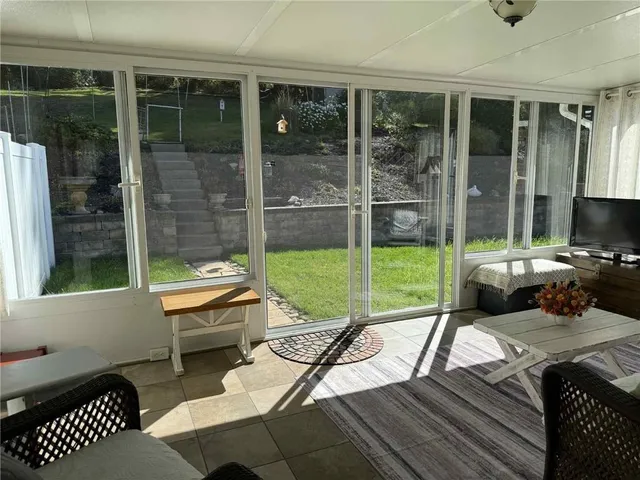 a view of a yard with an outdoor space