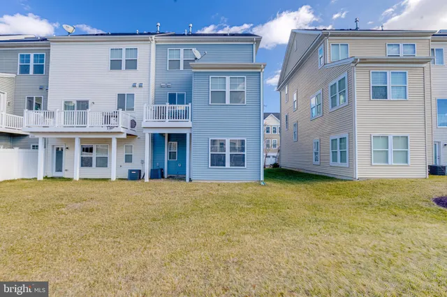 a front view of house with outdoor space
