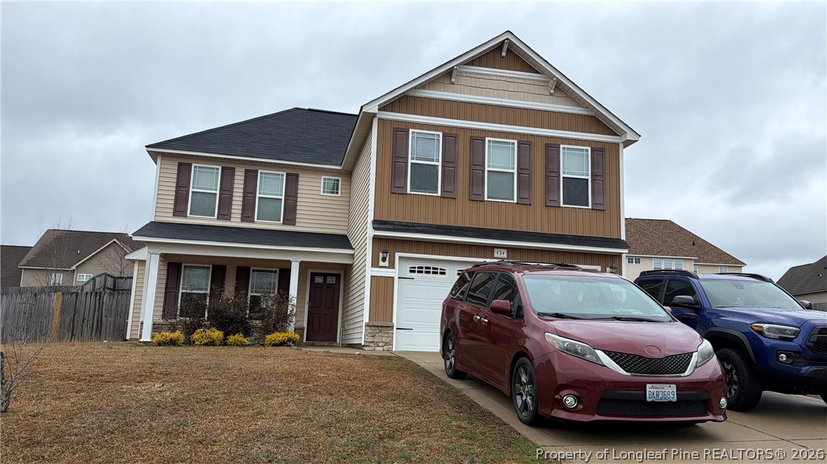 a car parked in front of a house
