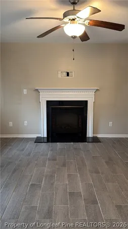 a living room with a fireplace