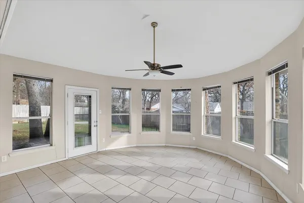a view of a room with windows