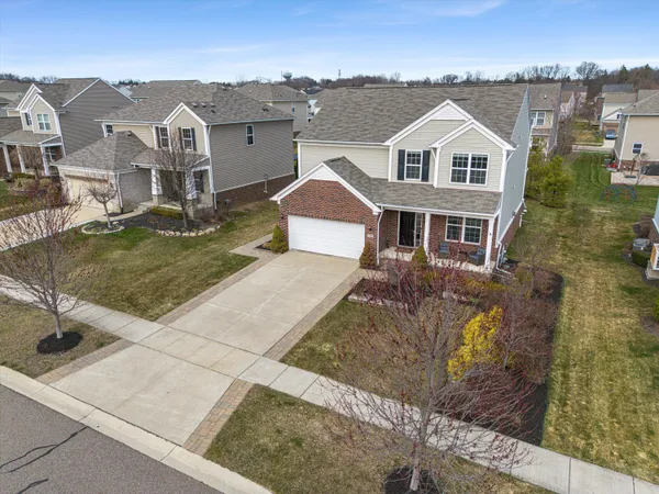$635,000 | 57662 Village Drive, New Hudson, MI 48165